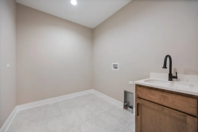 a bathroom with a sink and vanity