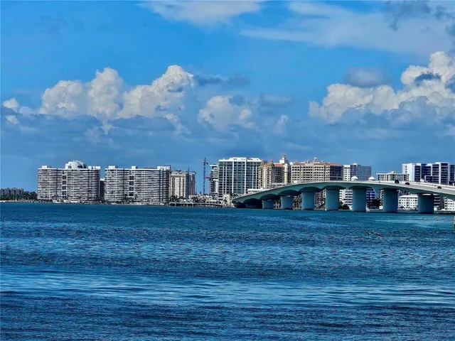 a view of city with the shops and fruits market