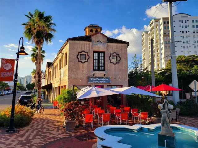 a front view of a building with garden