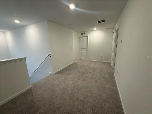 a view of a room with an empty space