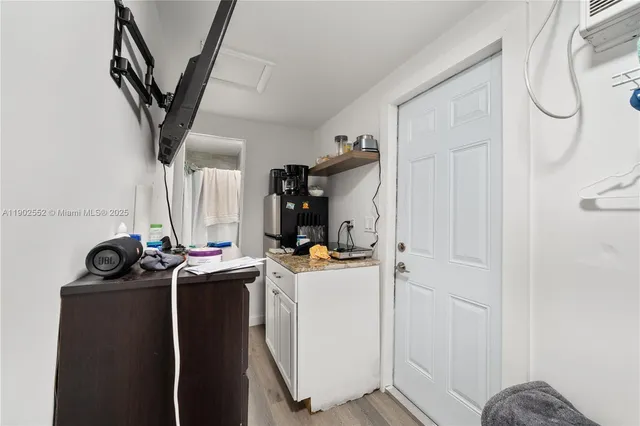 a view of a storage & utility room with washer and dryer