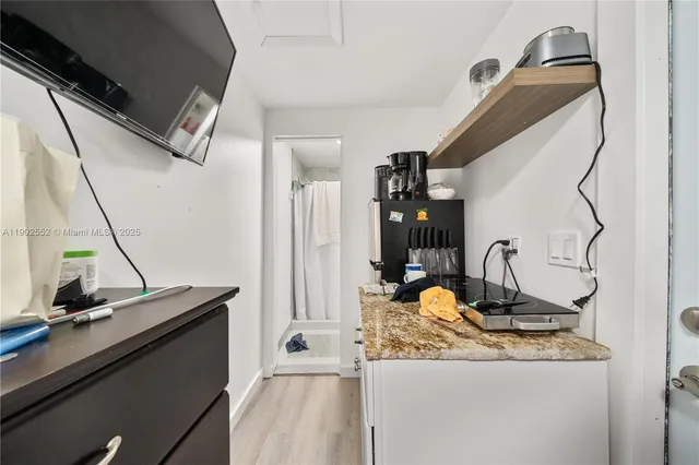 a view of living room with furniture and floor