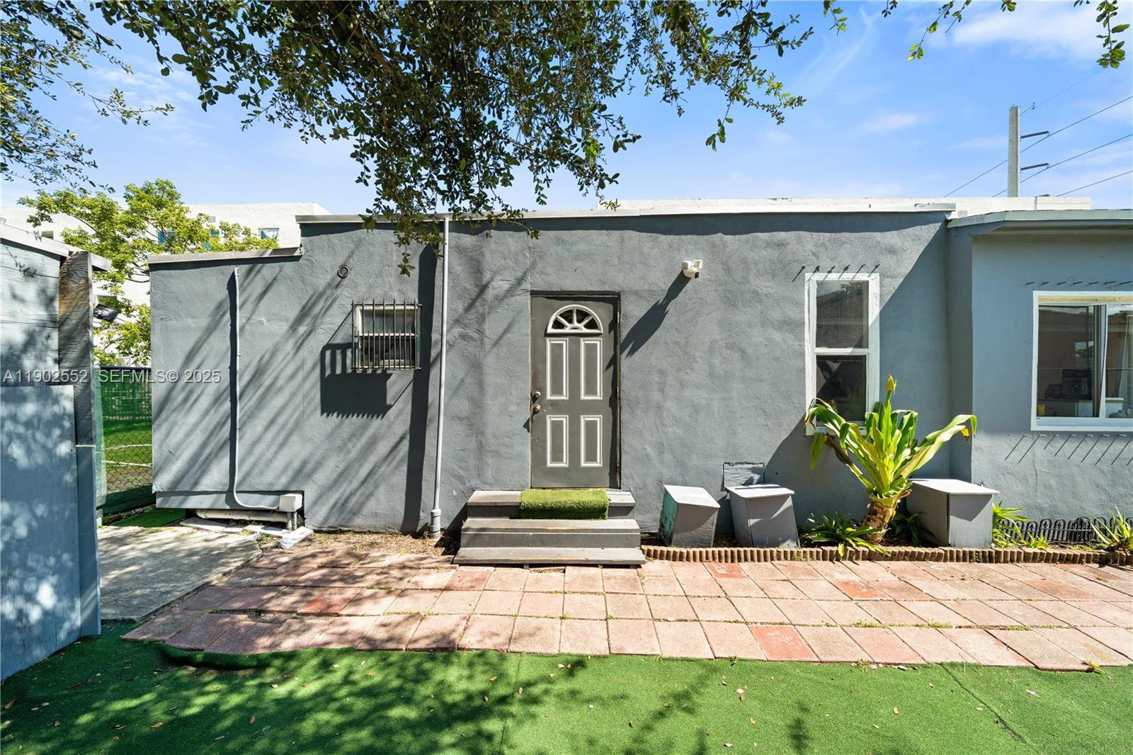 1257 Northwest 58th Street Miami, FL 33142 - Photo 27 of 27 a view of entrance gate of the house