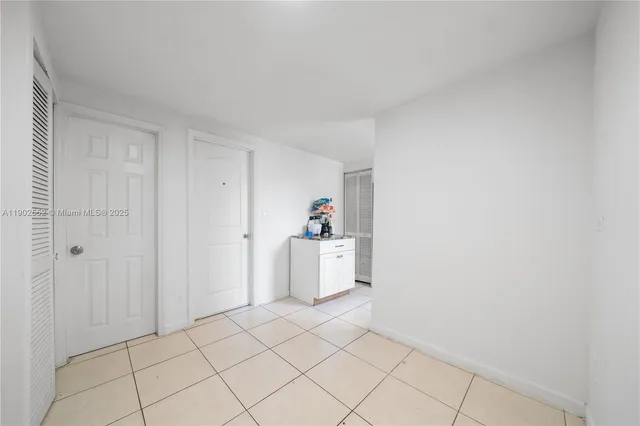 a view of a storage & utility room with a window