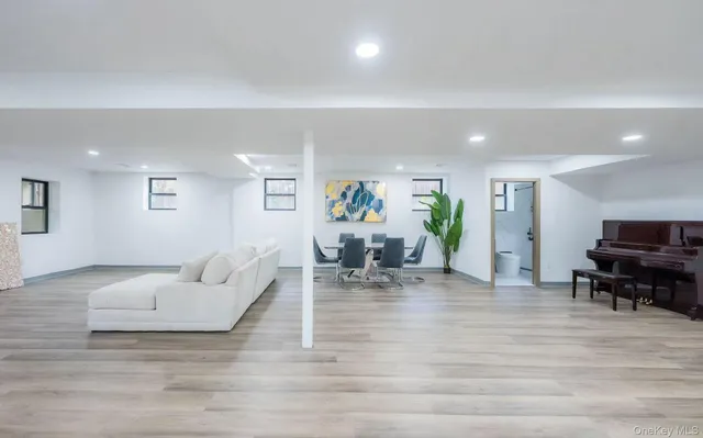 a living room with furniture and a table