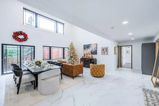 a living room with furniture and a table