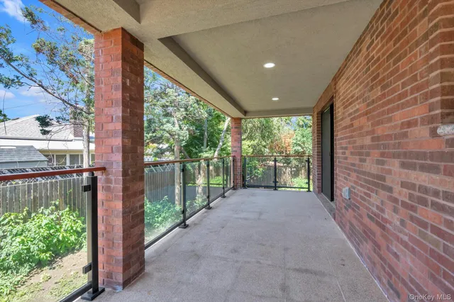 a outdoor living space with furniture and city view