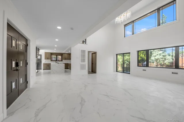 a view of livingroom with furniture and windows