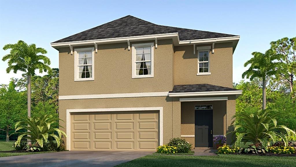 7740 Cypress Walk New Port Richey, FL 34655 - Photo 1 of 1 a front view of a house with garden