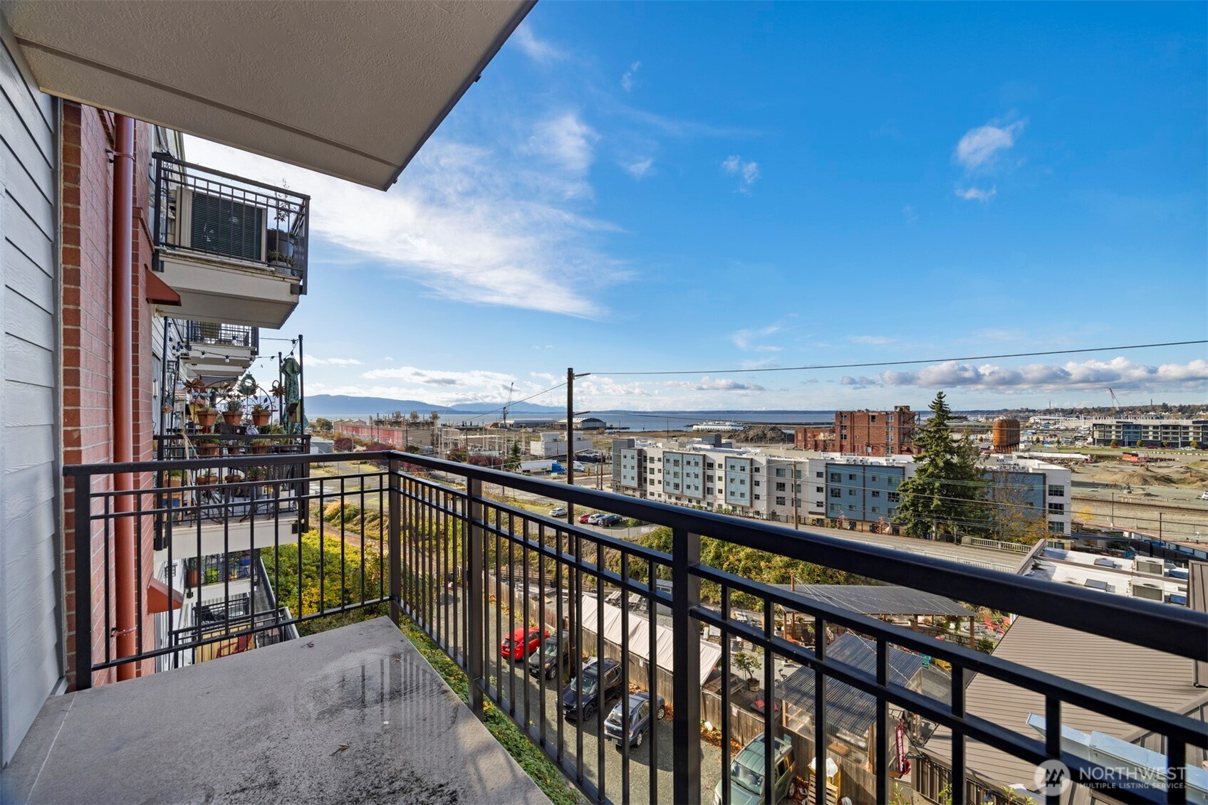 1015 Railroad Avenue, Unit 418 Bellingham, WA 98225 - Photo 1 of 23 a view of city from a balcony