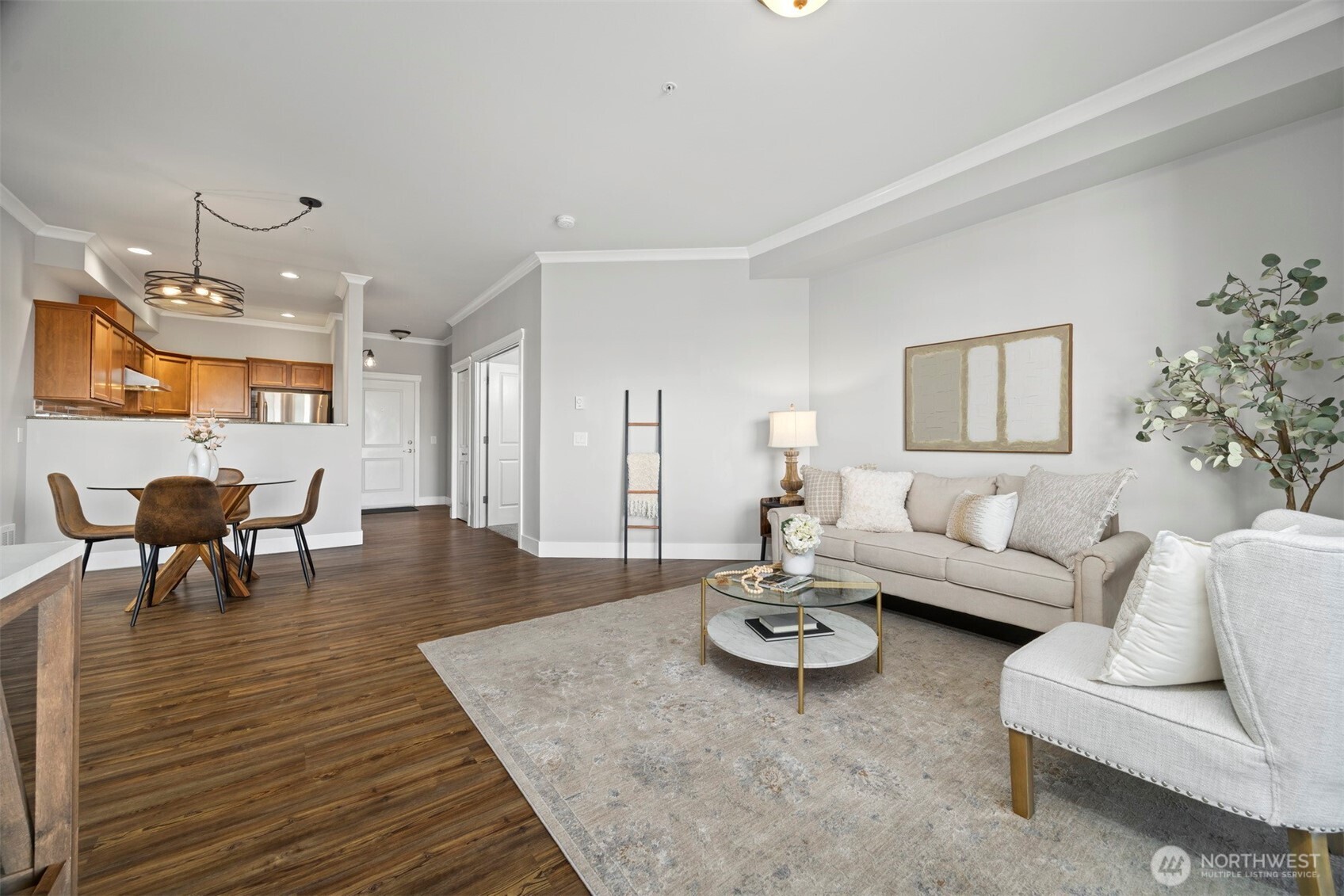 1015 Railroad Avenue, Unit 418 Bellingham, WA 98225 - Photo 11 of 23 a living room with furniture and wooden floor