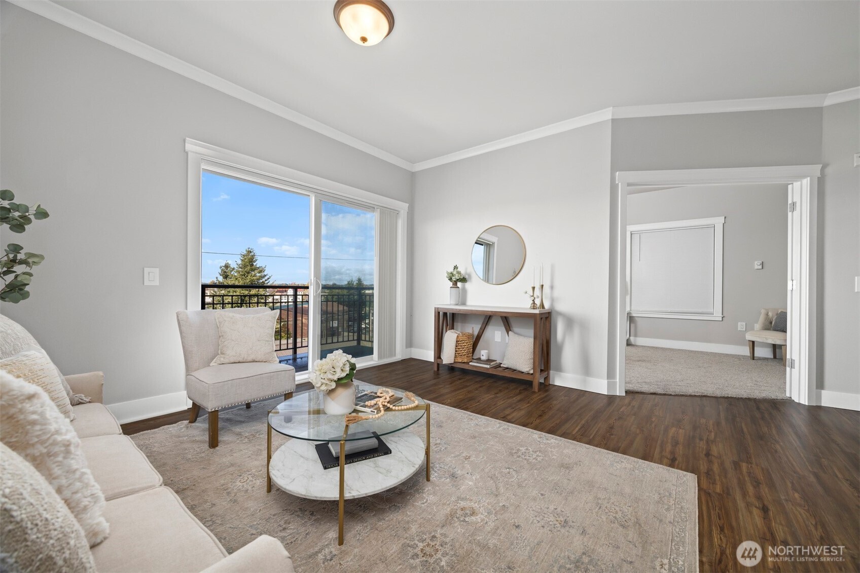 1015 Railroad Avenue, Unit 418 Bellingham, WA 98225 - Photo 12 of 23 a living room with furniture and a wooden floor