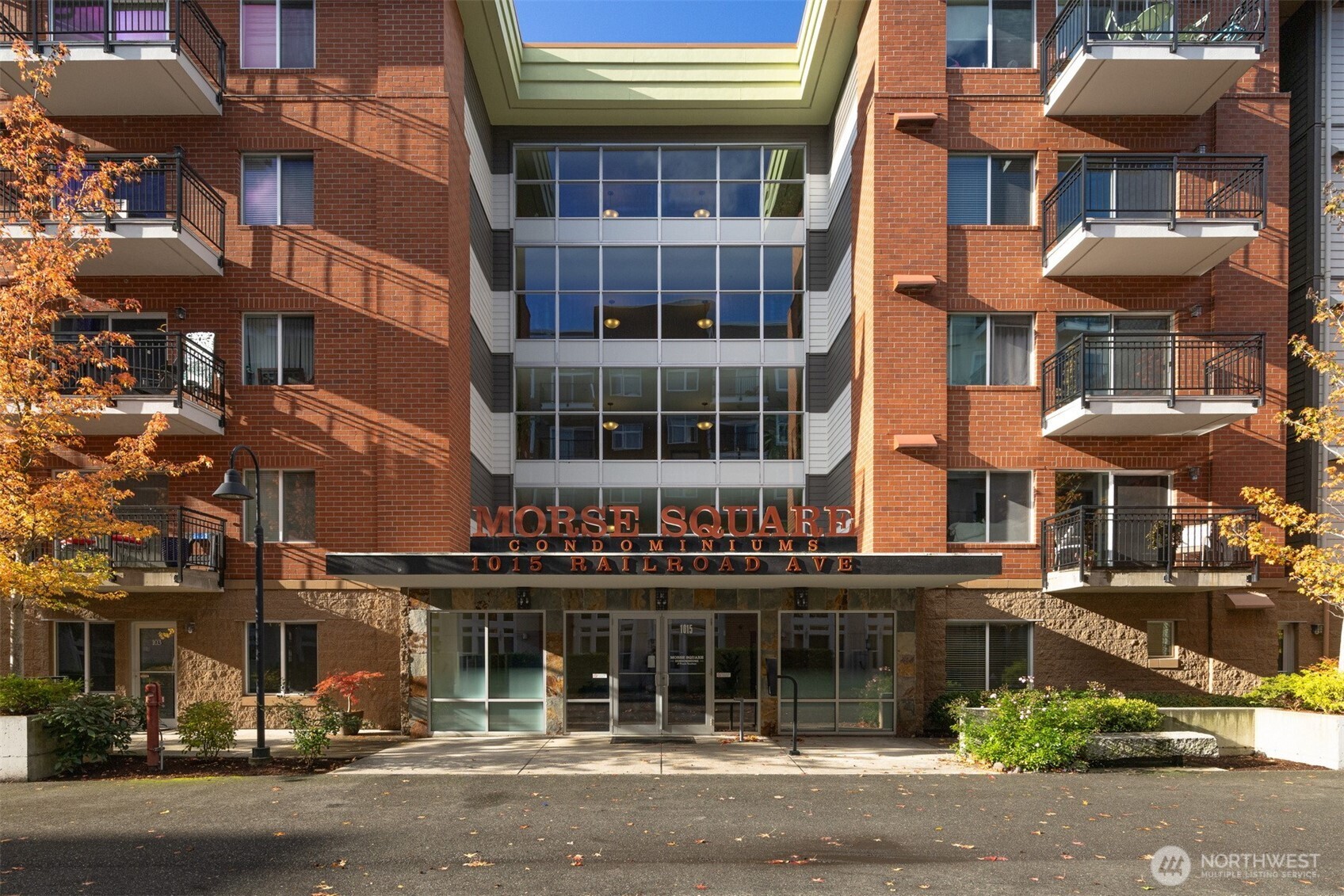 1015 Railroad Avenue, Unit 418 Bellingham, WA 98225 - Photo 3 of 23 a front view of a building and a street