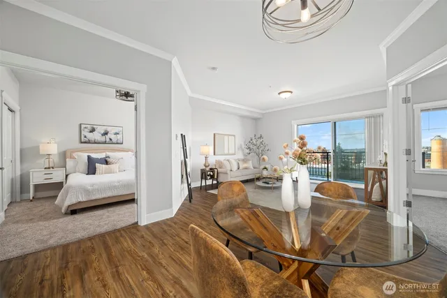 a living room with furniture and a table