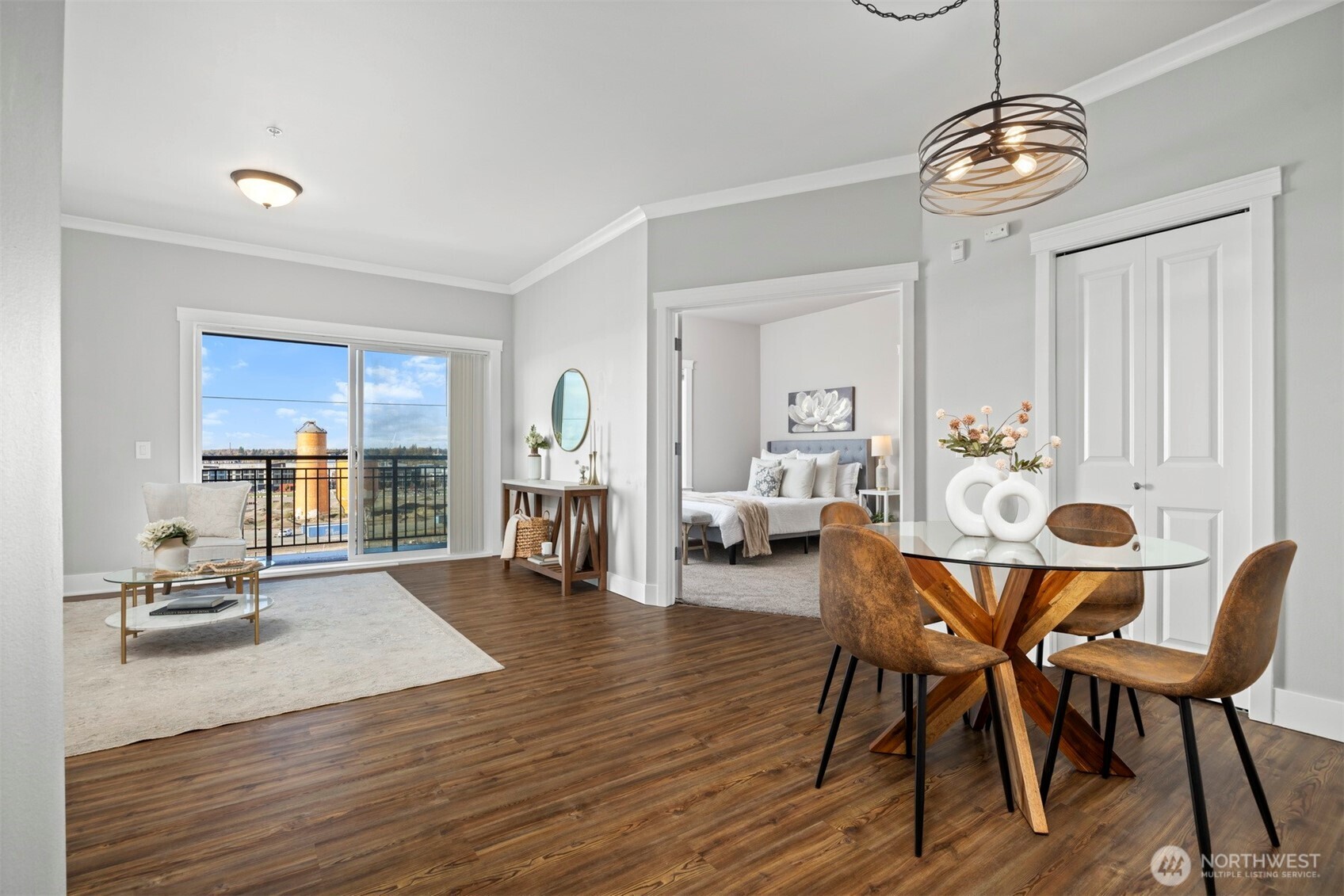 1015 Railroad Avenue, Unit 418 Bellingham, WA 98225 - Photo 9 of 23 a view of a dining room with furniture window and wooden floor
