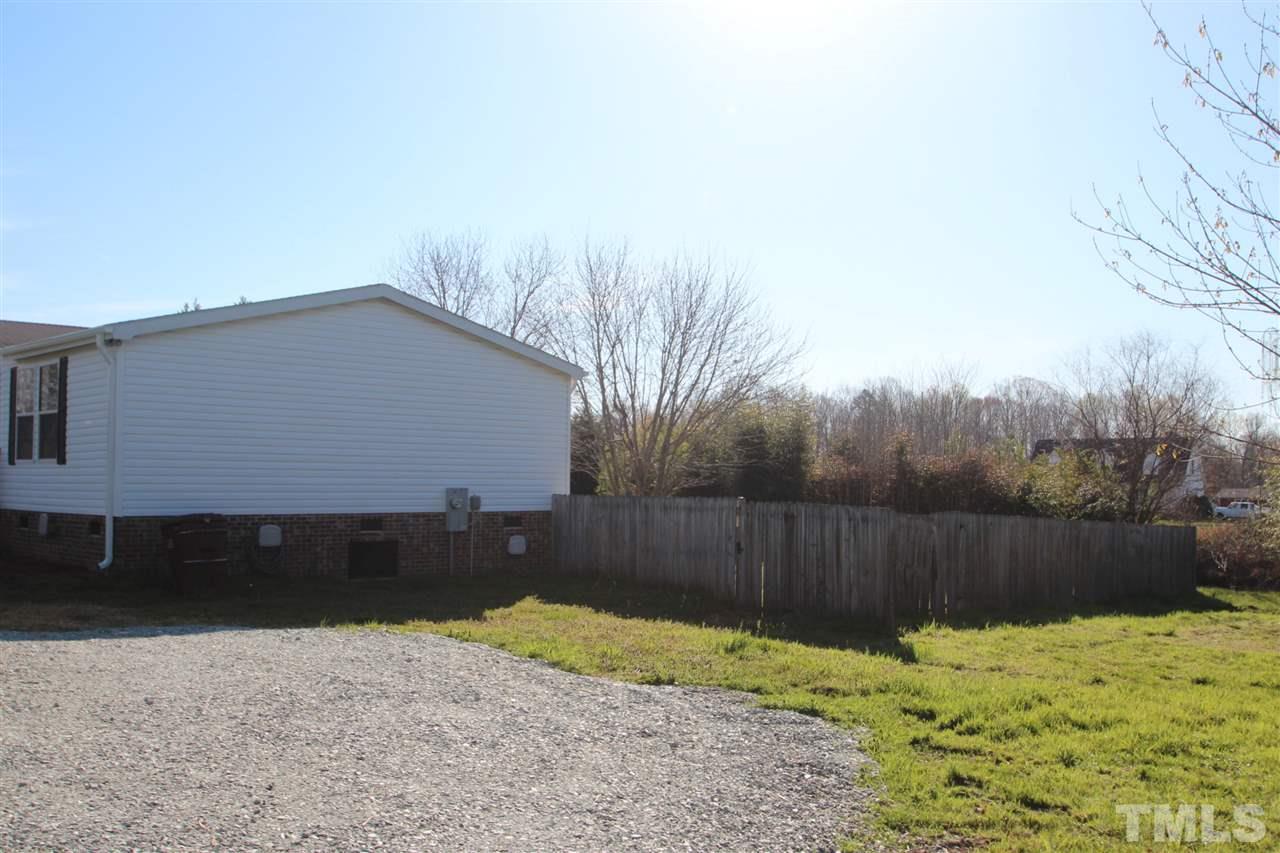 1336 Pixley Pritchard Road Timberlake, NC 27583 - Photo 2 of 4 a backyard of a house