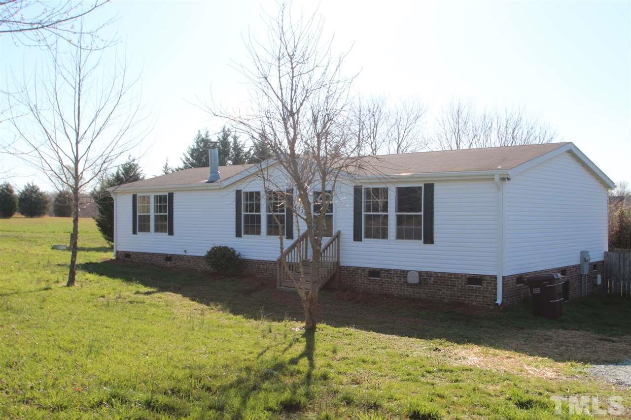 1336 Pixley Pritchard Road Timberlake, NC 27583 - Photo 3 of 4 a view of a house with a yard