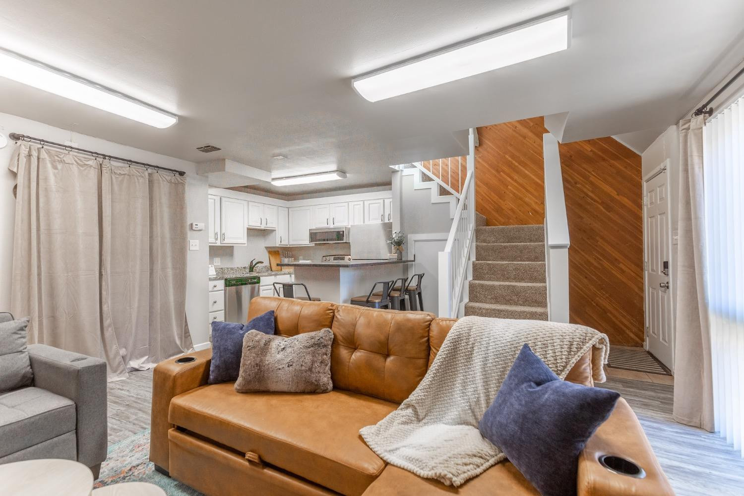 2124 Broadway Street Lubbock, TX 79401 - Photo 5 of 14 a living room with furniture and a large window
