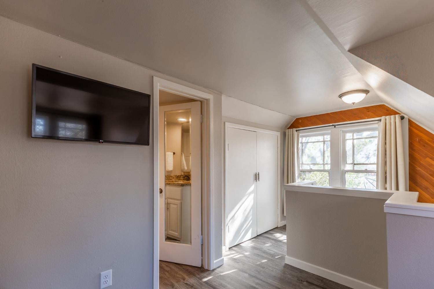 2124 Broadway Street Lubbock, TX 79401 - Photo 10 of 14 a view of a living room with a flat screen tv