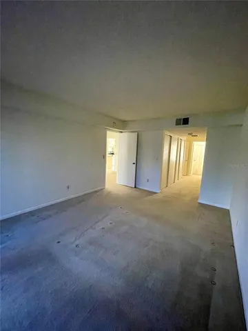 a bathroom with a shower a toilet and a sink