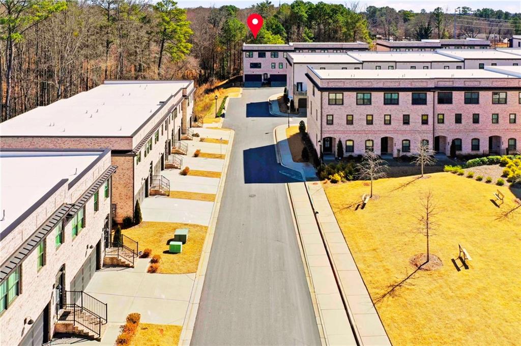 a view of a swimming pool with seating area