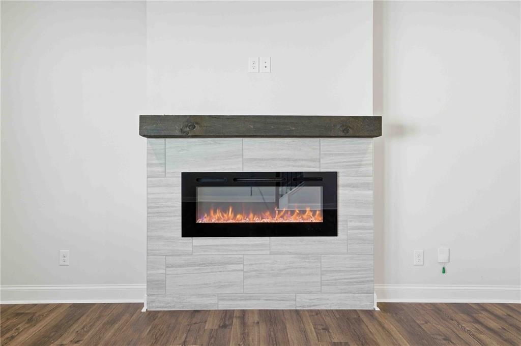 3302 Monarch Avenue Duluth, GA 30096 - Photo 18 of 83 a room with a fireplace