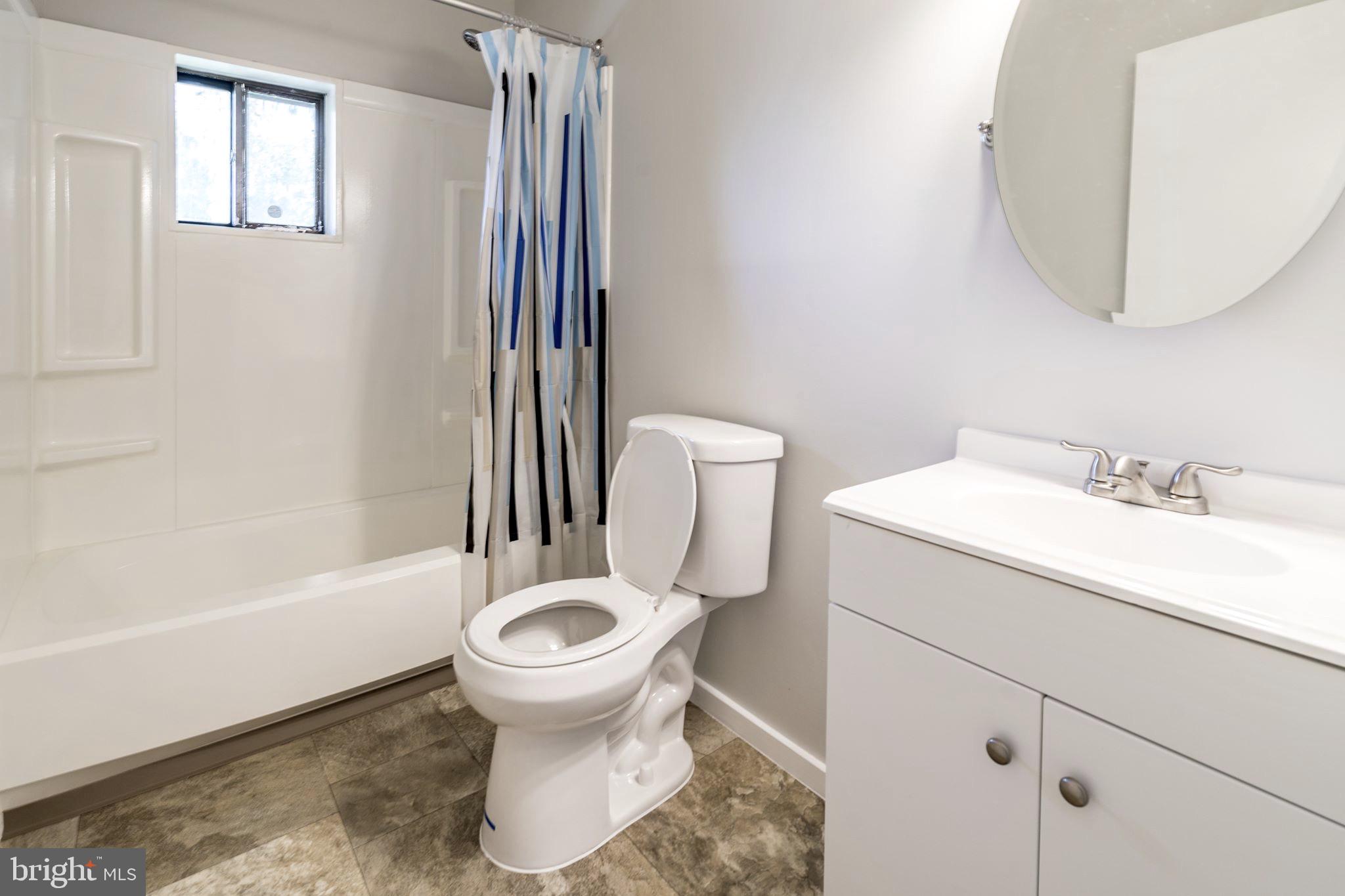 3926 Rolling Rd., Unit 11D Baltimore, MD 21208 - Photo 15 of 22 Updated Full Bath with resurfaced tub & shower