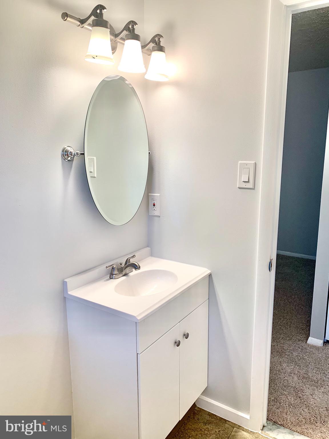 3926 Rolling Rd., Unit 11D Baltimore, MD 21208 - Photo 16 of 22 New Vanity, Mirror & Trendy Lighting
