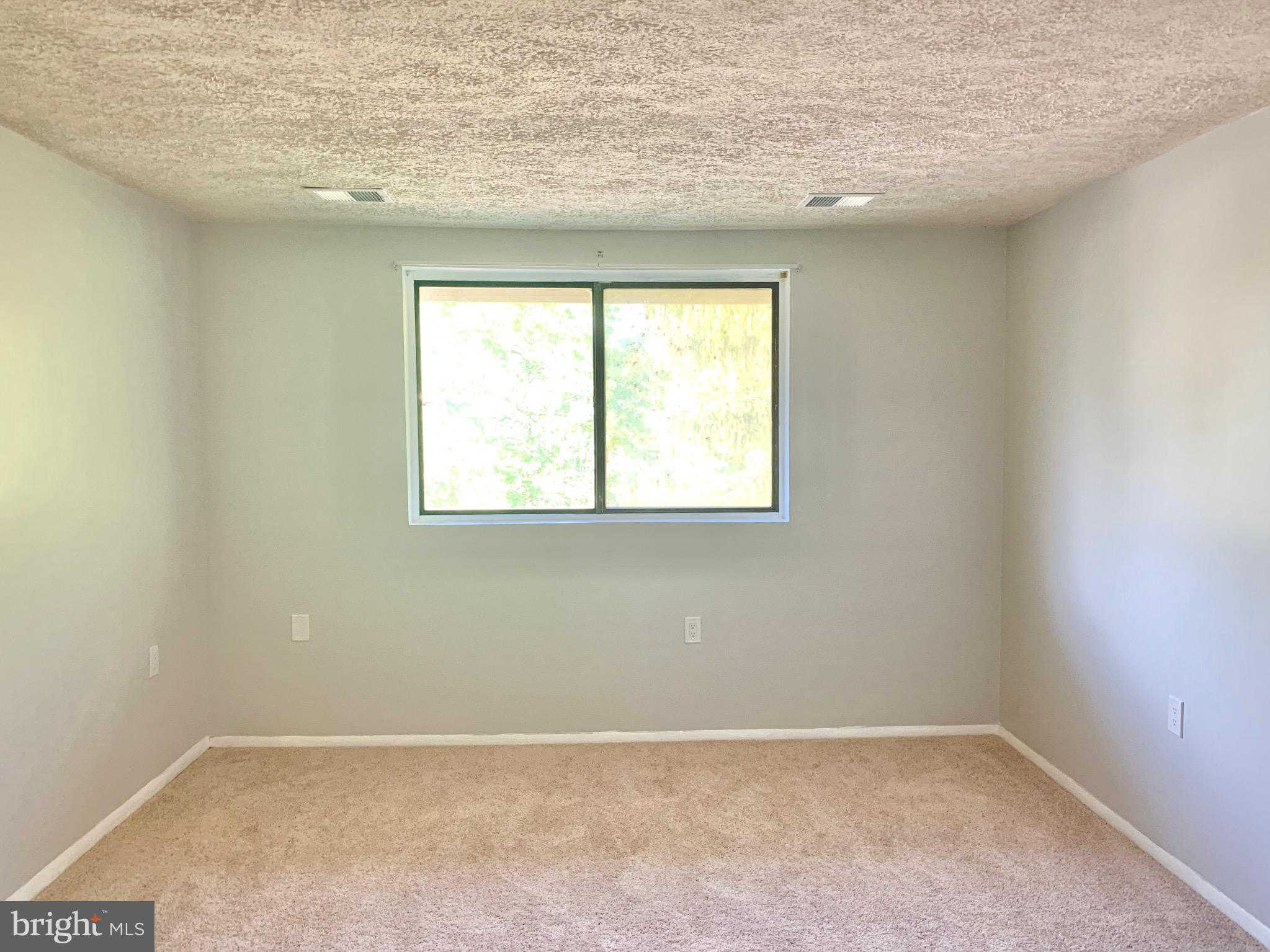 3926 Rolling Rd., Unit 11D Baltimore, MD 21208 - Photo 18 of 22 Another View of Bedroom with New Carpeting