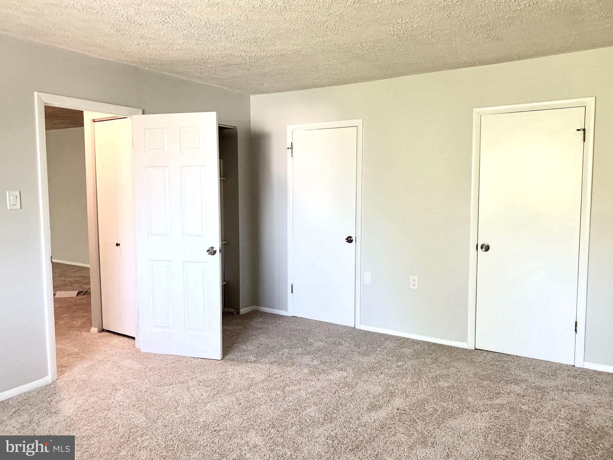 3926 Rolling Rd., Unit 11D Baltimore, MD 21208 - Photo 19 of 22 His & Her Closets run full length of wall
