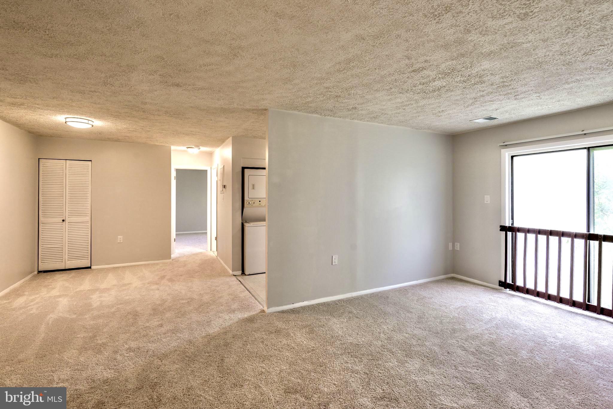 3926 Rolling Rd., Unit 11D Baltimore, MD 21208 - Photo 9 of 22 View of Living Area into Dining & Kitchen