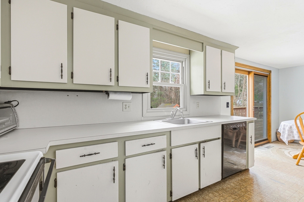 10 Wapping Road Kingston, MA 02364 - Photo 5 of 21 a kitchen with appliances cabinets and a window