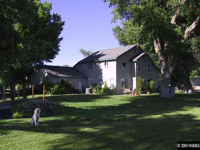 5741 Rivers Edge Drive, Unit 1 Fallon, NV 89406 - Photo 2 of 5 a front view of a house with a yard