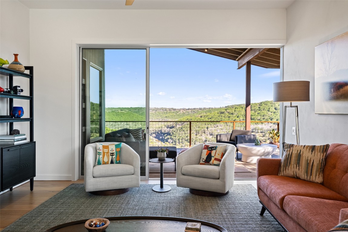 2037 Wolf Creek Ranch Road Burnet, TX 78611 - Photo 20 of 40 a living room with furniture and a large window