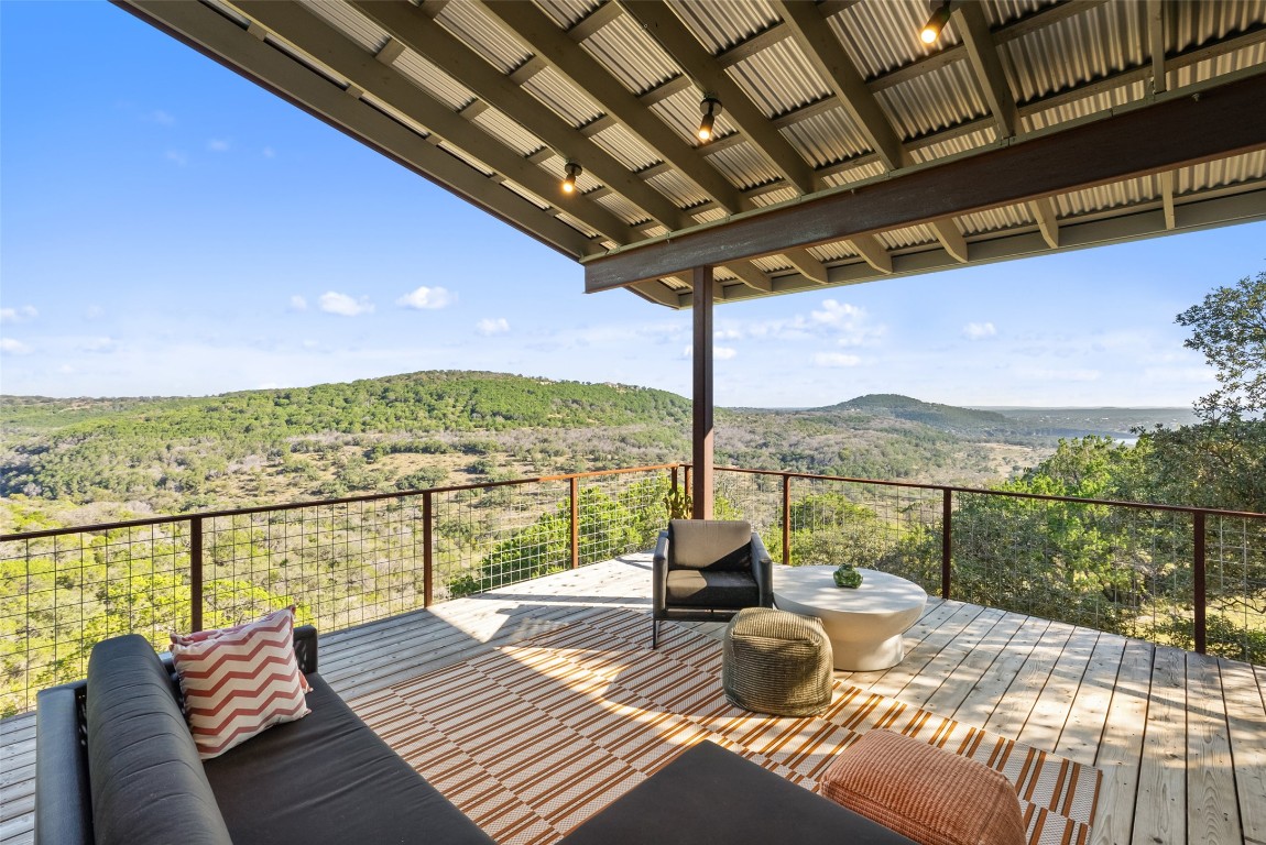 2037 Wolf Creek Ranch Road Burnet, TX 78611 - Photo 27 of 40 a view of a balcony with a ocean view