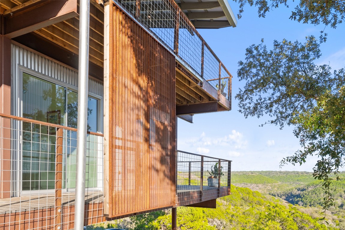 2037 Wolf Creek Ranch Road Burnet, TX 78611 - Photo 34 of 40 a balcony view with a ocean view
