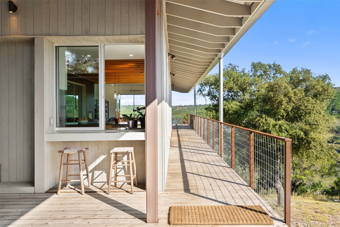 2037 Wolf Creek Ranch Road Burnet, TX 78611 - Photo 7 of 40 a view of balcony with furniture