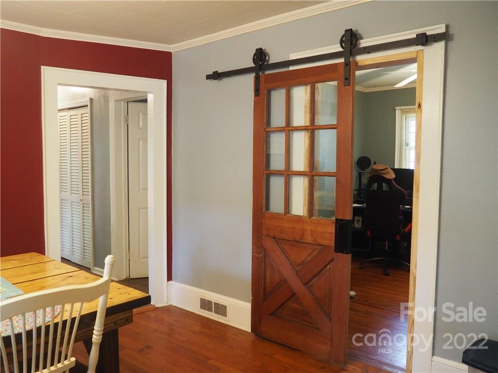 439 North Main Street Rutherfordton, NC 28139 - Photo 13 of 33 a bedroom with a bed and a window