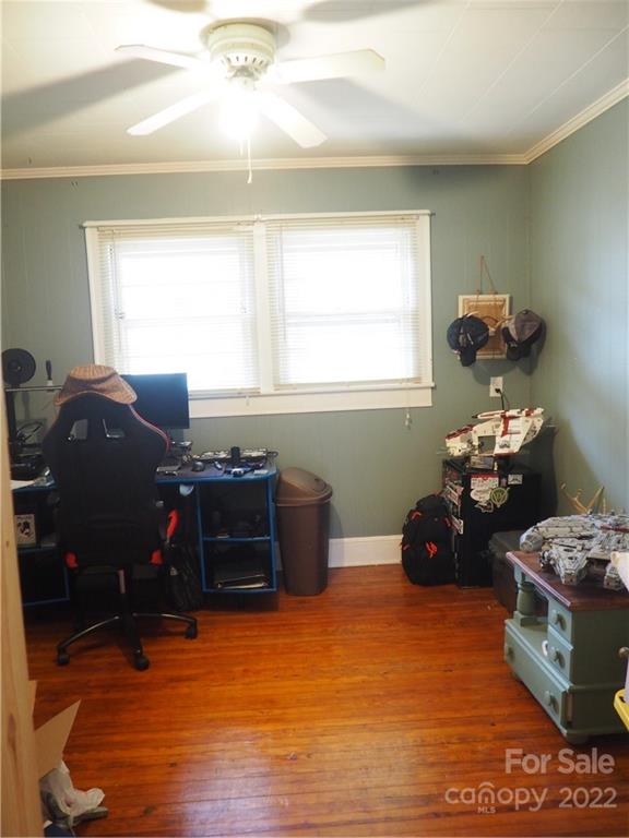 439 North Main Street Rutherfordton, NC 28139 - Photo 14 of 33 a bedroom with a bed and a window