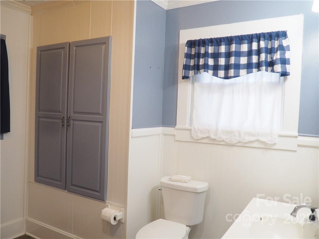 439 North Main Street Rutherfordton, NC 28139 - Photo 16 of 33 a bathroom with a sink and a toilet