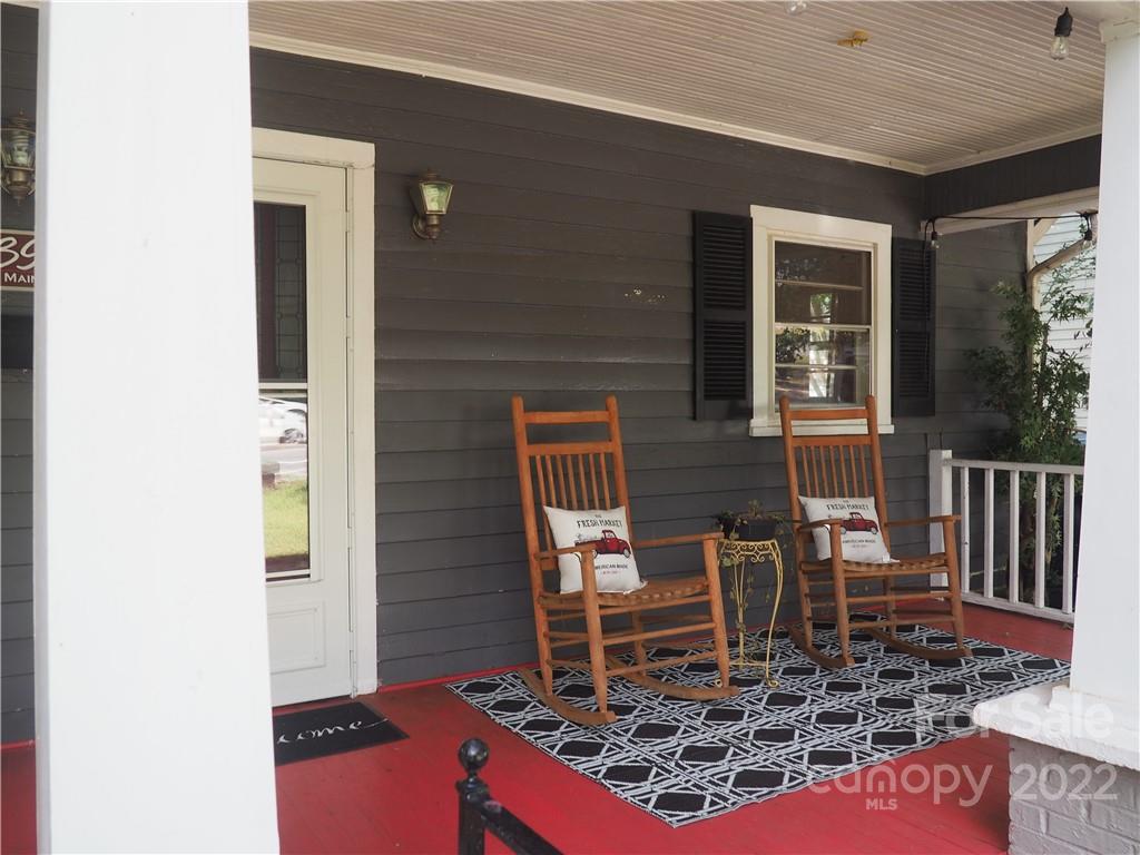 439 North Main Street Rutherfordton, NC 28139 - Photo 2 of 33 a backyard of a house with table and chairs