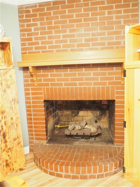 439 North Main Street Rutherfordton, NC 28139 - Photo 22 of 33 a view of a fireplace with wooden door