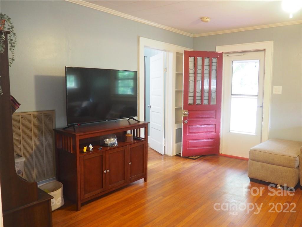 439 North Main Street Rutherfordton, NC 28139 - Photo 5 of 33 a living room with furniture and a flat screen tv