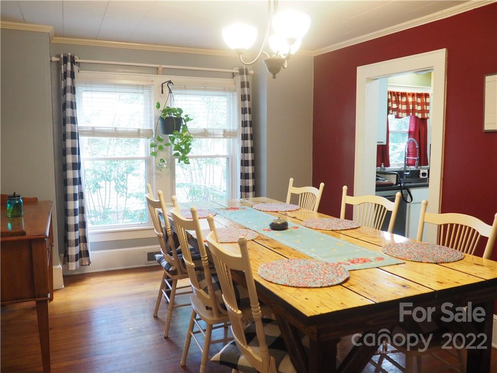439 North Main Street Rutherfordton, NC 28139 - Photo 7 of 33 a view of a dining room with furniture window and wooden floor