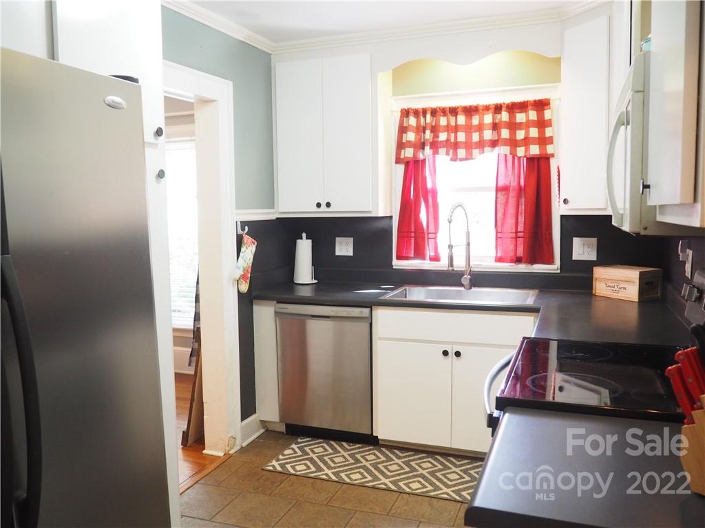 439 North Main Street Rutherfordton, NC 28139 - Photo 8 of 33 a kitchen with a refrigerator and window
