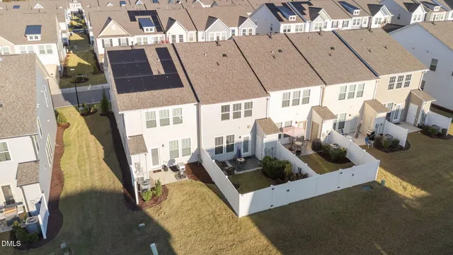 a view of living room with furniture and floor to ceiling window