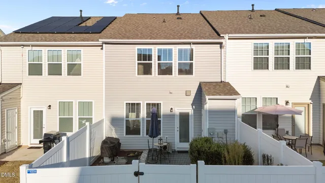 a front view of a house with street