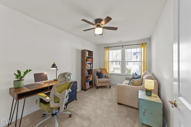 a work room with furniture and windows