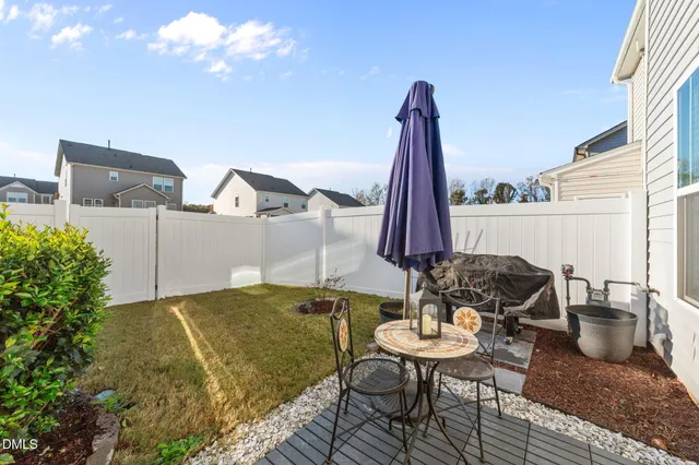a view of a table and chairs in patio