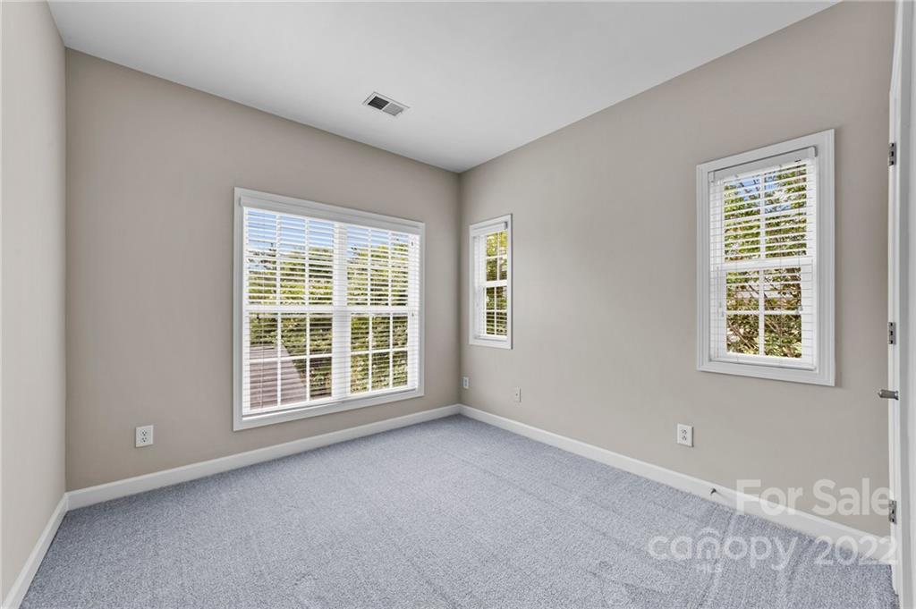 10559 Rocky Ford Club Road Charlotte, NC 28078 - Photo 14 of 18 an empty room with a window